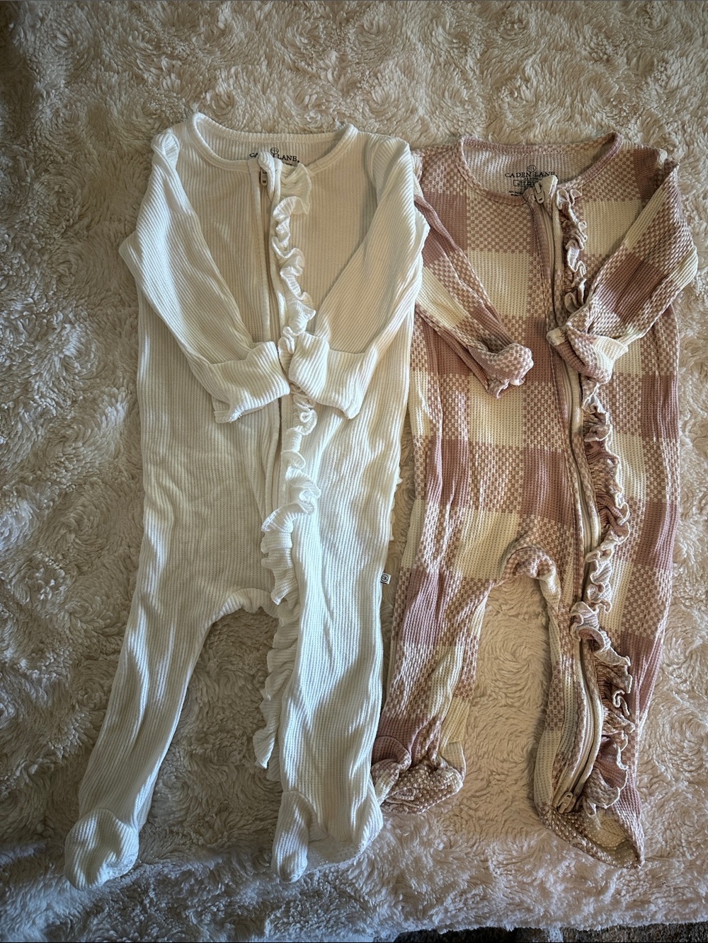 Caden Lane Ribbed Ruffle Butt Footed Rompers - Cream and Mauve Check 95% bamboo